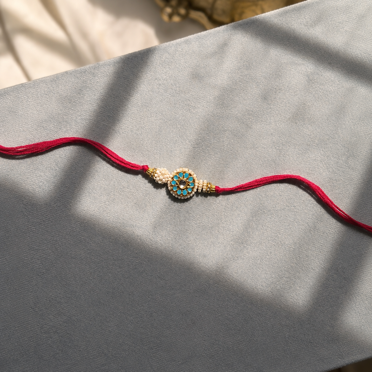 Turquoise Bloom Rakhi